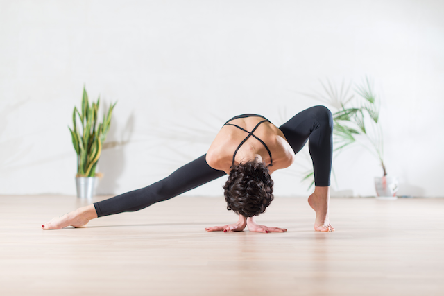 Flexible woman shows how your website can also be flexible